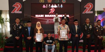 Polres Gorontalo Gelar Syukuran Hari Bhayangkara Ke-79 Tahun 2025 di Gedung Kasmat Lahay Limboto.