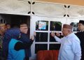 Bupati Sofyan Puhi Bersama Wabup Tonny Junus Tempel Stiker Homestay Penas KTNA XVII di Limboto